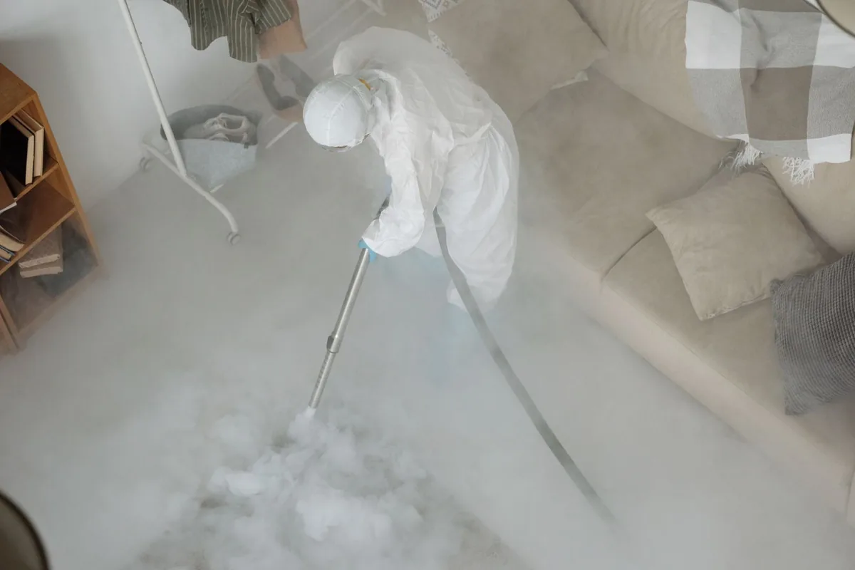 Biohazard cleanup technician in protective equipment, New Washington, OH